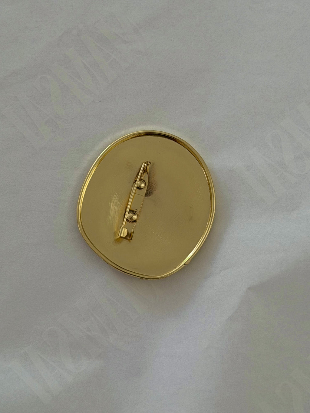 Broche Dorado